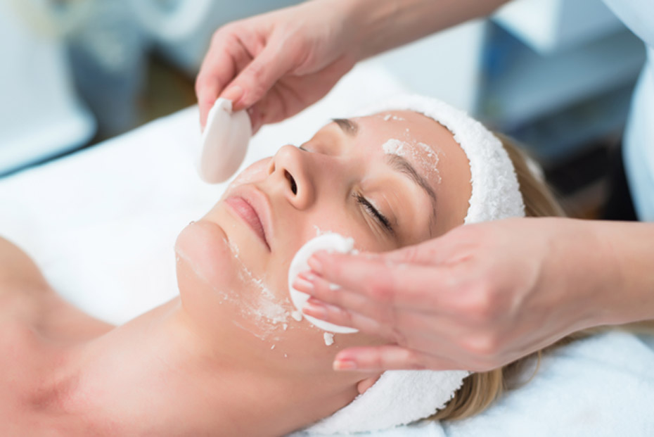 womans-face-being-cleansed-before-microdermabrasion